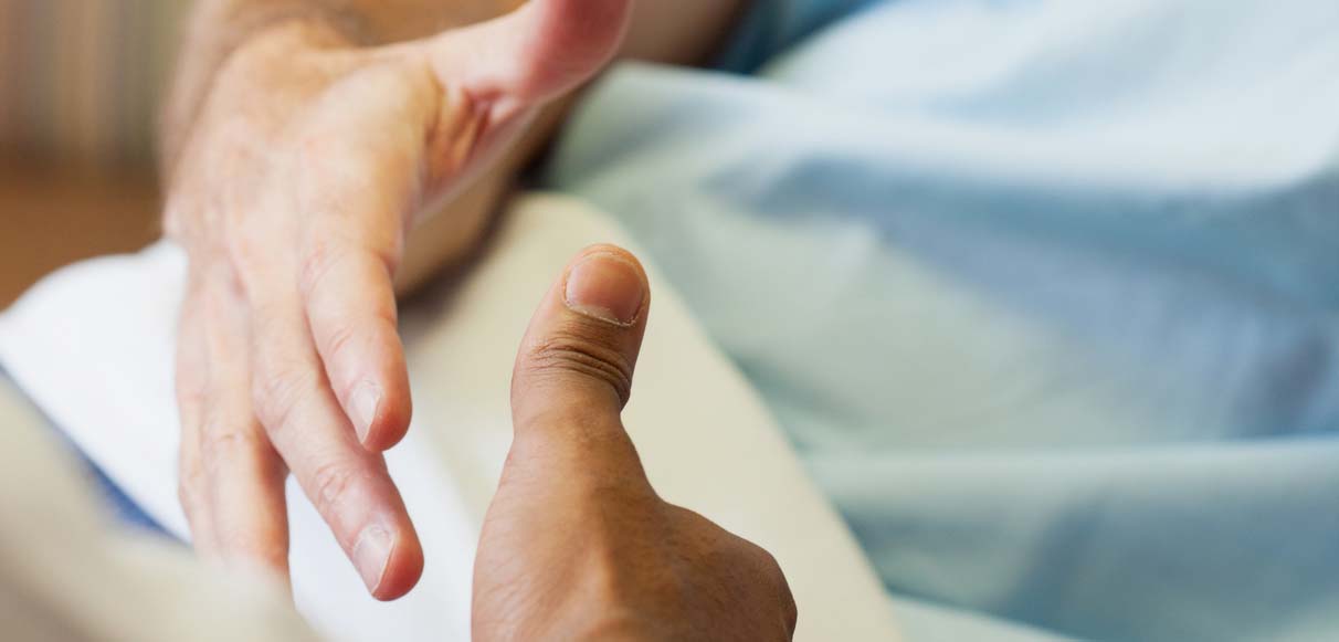 Hospital: Patient And Doctor Shake Hands